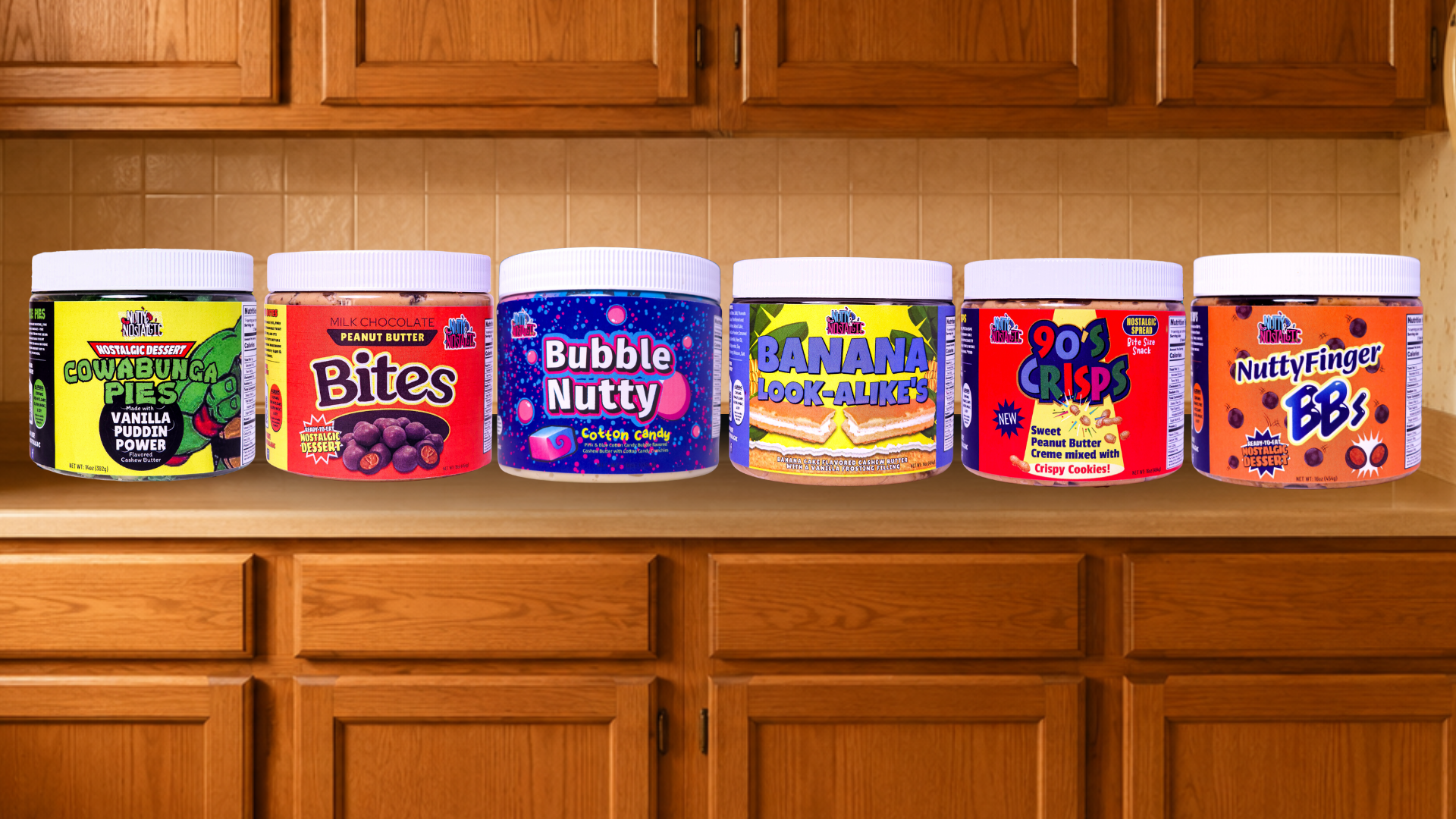 All six Nutty and Nostalgic drop jars lined up on a 1990s kitchen counter
